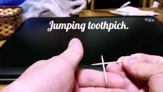Jumping toothpick magic trick.