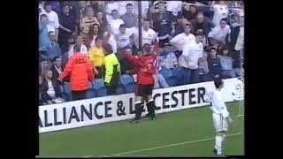 Eric Cantona celebrating right in front of Leeds fans at Elland Road in 1996 after making it 4-0.