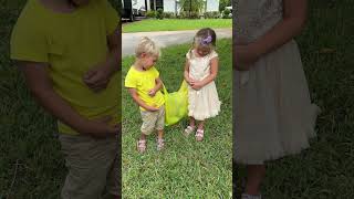 Cute Walking Shorts! Toddlers are picking mangoes in the garden