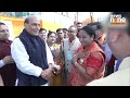 delhi cm designate rekha gupta greets defence minister rajnath singh at ramlila maidan news9