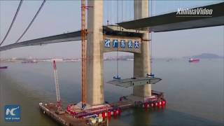 World's largest-span steel-box beam suspension bridge nears completion