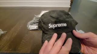 Unboxing: Supreme FW2022 week 16 tees, cap, puffer bag - January 3, 2023