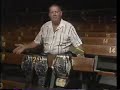 Fritz Von Erich shows the World Class Belts. WCCW 1987