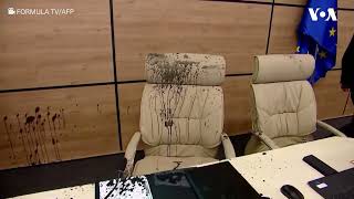 Georgian opposition member splashes black liquid on poll body chair | VOA News