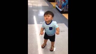 Kenzo trying on sandals