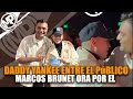 DADDY YANKEE entre el público y Marcos Brunet ora por el