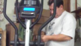 Timothy T. Pettit working on an elliptical