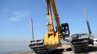 EIK International AM200 Amphibious Excavator on CAT320D Installation Process