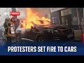 France: Police fire tear gas as protesters set fire to cars and buildings