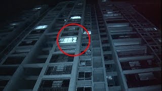 Boy rescued after being stuck outside window of building