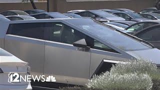 Why are hundreds of Teslas parked in a Scottsdale parking lot?