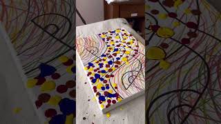 Creating a colorful abstract art piece with paint drops. 🎨 #short #abstractart #