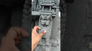 stone carved inside the statue of lion.