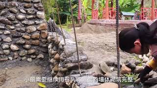 女人依靠勤劳的双手建造出漂亮石屋，太牛了