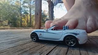 My friend dominating this little #Miata with her #bigfeet #giantess