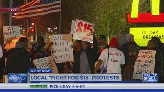 Protesters gather in Durham, across US to demand $15 minimum wage, union rights