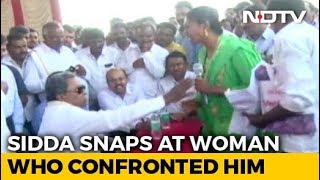 Siddaramaiah Caught On Camera Snatching Mic From Woman In Fit Of Rage