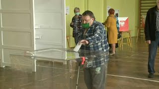 Poland votes in tight presidential election | AFP