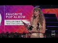 taylor swift accepts the 2022 ama for favorite pop album the american music awards