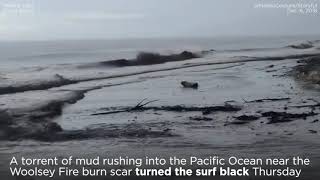 Waves turn black as mud rushes into ocean from Woolsey Fire burn scar