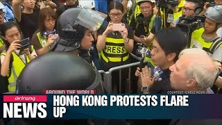 Hong Kong police fight with protesters amid rising tensions