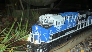 RUNNING LIONEL LEGACY POWER IN THE POURING RAIN AT NIGHT