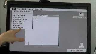 Mum tries out Mac OS System 1.1 (1984)