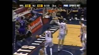 Tim Thomas` dunk over Todd MacCulloch in 2002