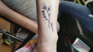 Flowers on wrist tattoo by Boris Kuryakin, May 18, 2018.