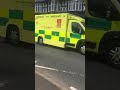 Ambulance on blue lights in Northwich