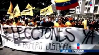 Policías venezolanos usan balas para reprimir protestas