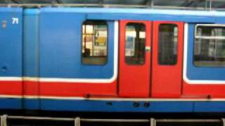 Classic DLR: B92 Stock train at West India Quay (Original livery)