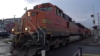 (Northbound) BNSF Mixed Freight Train passes through the McCarver Street Railroad Crossing.