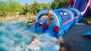 Giant Backyard Waterslide Into 1000 Pounds Of Dry Ice Giant Backyard Waterslide Into 1000 Pounds Of Dry Ice