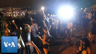 Hong Kong: Lantern Waving Protesters Take to Hills