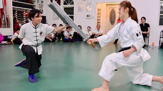 Karate Girl tries Sword Battle technique of Chinese Kung-fu!
