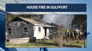 Crews battle house fire in Gulfport