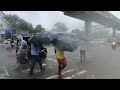 mumbai rain walking on streat of marol village in heavy rain.