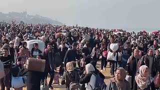 Tens of thousands return to devastated northern Gaza as Israel lifts its closure under truce