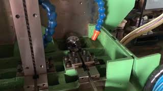 Remove tooling from 4 spindles nut tapping machine