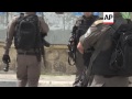 Israel police and Palestinians clash in B'hem