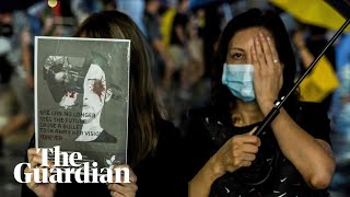 Hong Kong demonstrators explain reason for protests as thousands gather in rain