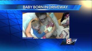 Gray woman delivers baby in driveway