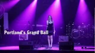 Nicole DeCosta hosts Portland's Grand Ball from the stage