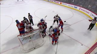 Richardson and Plekanec drop the mitts during scrum