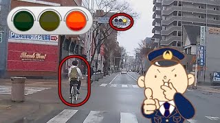 赤信号を突破する自転車