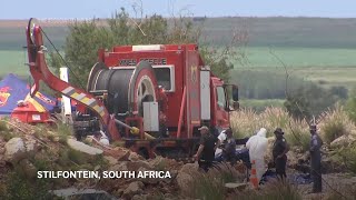 Rescuers and volunteers pull more bodies of dead workers from abandoned gold mine in South Africa