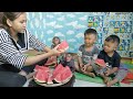 mimi kuku and brother politely wait for mom to share the watermelon