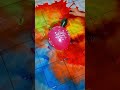 pink happy birthday balloon and 10 mini rainbow balloons popping reverse asmr satisfying