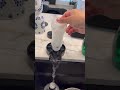 rinsing a bottle and the sucker